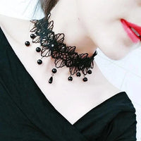 Choker dentelle noire – pendentif étoile gothique