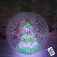 Boule de Noël LED gonflable avec sapin de noël.